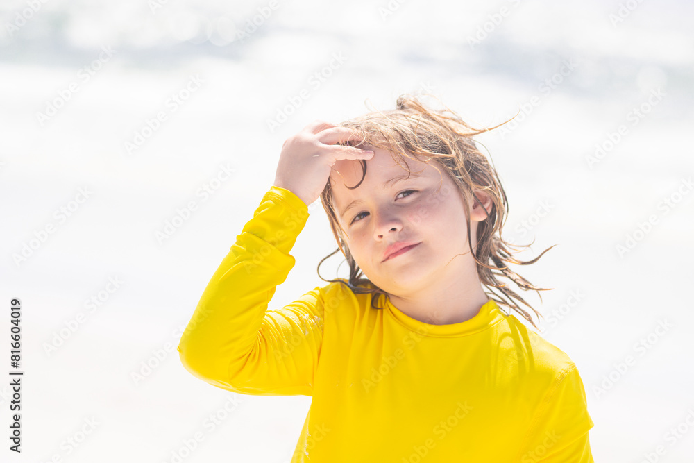 Kid boy play on summer beach. Little kid on summer vacations. Happy child rest on sea. Summer vacation concept. Kids summer travel and adventure. Happy childhood. Kid boy play on summer beach. Little kid on summer vacations. Happy child rest on sea. Summer vacation concept. Kids summer travel and adventure. Happy childhood.