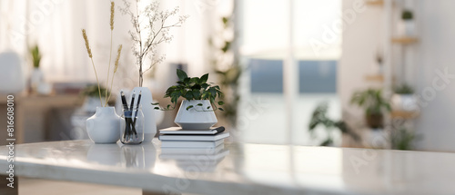 A luxury white coffee table feature a copy space for display products in a modern living room.