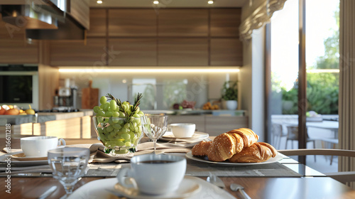 Interior of modern kitchen with pastry on dining table
