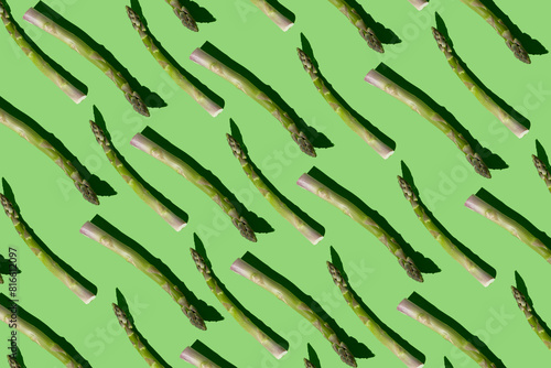 Asparagus pattern. Green food background. Vegetable sprouts Shadow