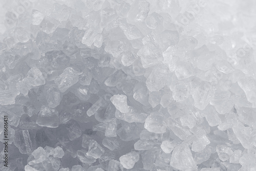 Pile of salt crystals closeup. Food background. photo