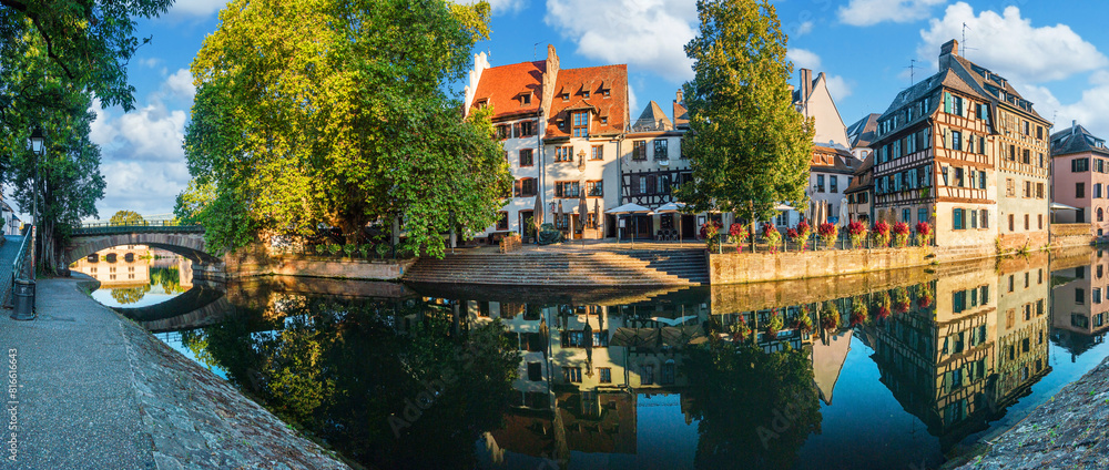 Le Petite France, the most picturesque district of old Strasbourg. Half-timbered houses with reflection in waters of the Ill channels. Le Petite France, the most picturesque district of old Strasbourg. Half-timbered houses with reflection in waters of the Ill channels.