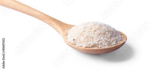Psyllium husk in wood spoon, closeup isolated on white background