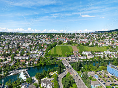 Tableau sur toile Aerial view of district Grünau and district Höngg with Limmat River and Europe Bridge at Swiss City of Zürich on a sunny spring afternoon