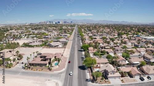 Aerial shot of Las Vegas suburb with strip city casino skyline in background 33