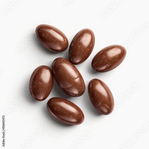 Wallpaper Mural Chocolate almonds arranged neatly on a clean white surface Torontodigital.ca