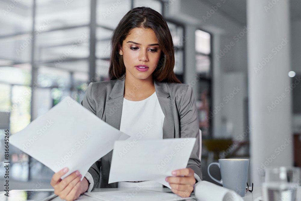 Business, woman and reading paperwork in office for proposal, startup project and corporate report. Workplace, professional and hr consultant with documents to check, analyse and information Business, woman and reading paperwork in office for proposal, startup project and corporate report. Workplace, professional and hr consultant with documents to check, analyse and information