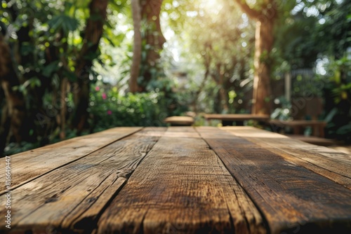 The picture of the wood table in the middle of the forest that surrounded with an uncountable amount of tree and plant in the forest with a bright light from the brightest sun of the daytime. AIGX03.