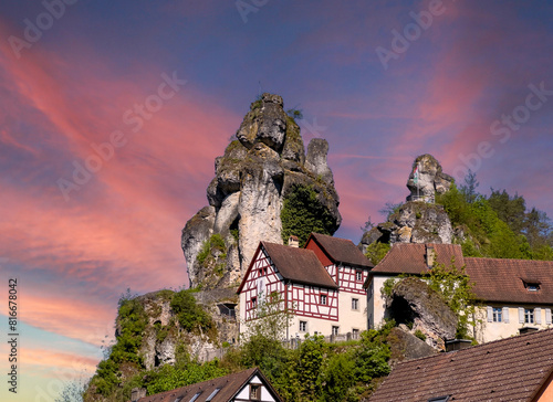 View of the rock castle in Tuechersfeld, Pottenstein in Franconian Switzerland, Bavaria Germany at sunset photo