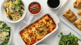 Elegant top-down shot of lasagna, fresh salad, and garlic bread set on a stark white background, perfect for high-focus advertising
