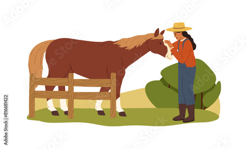Woman farmer touching horse at countryside farm. Rural worker in nature, vill...