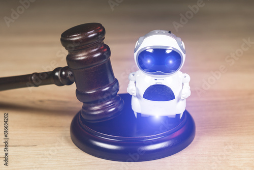 Adjudgement Gavel with wooden stand. Lawyer decision about Digital  assistant. Law and justice. Court of law. Pronouncing sentence to the AI Artificial Intelligence. photo