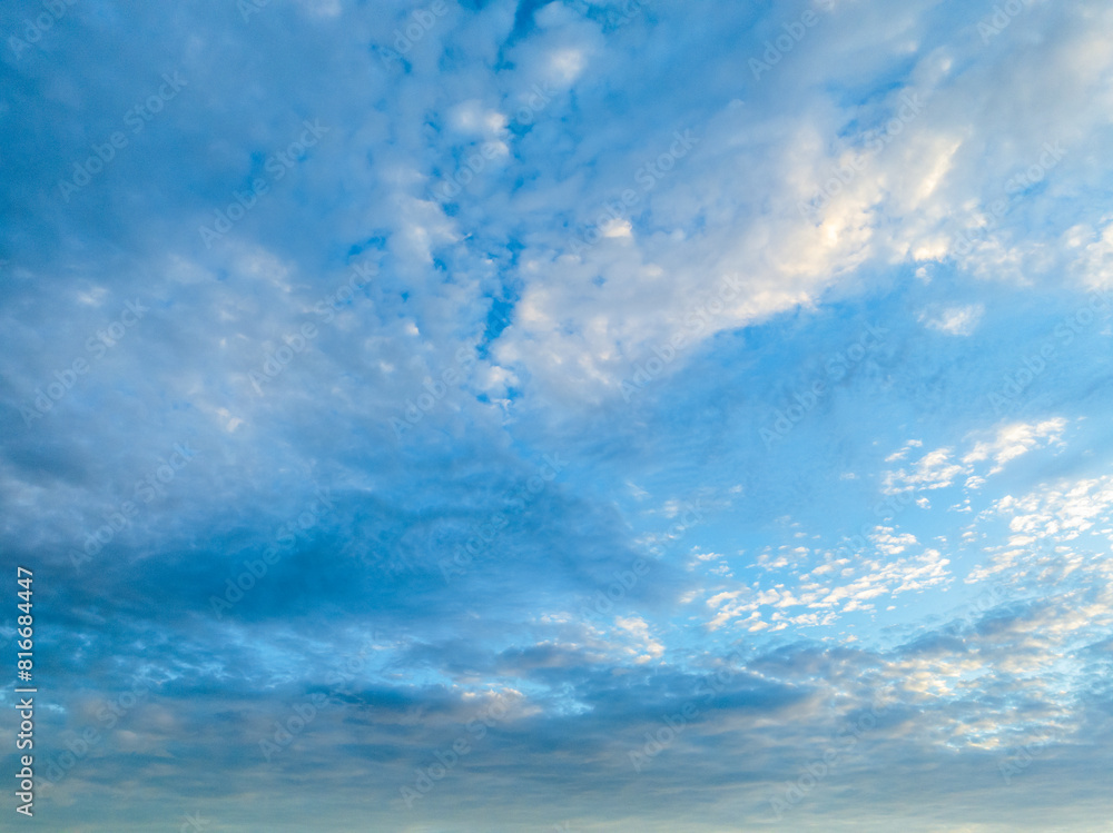 Blue sunrise sky with clouds Blue sunrise sky with clouds