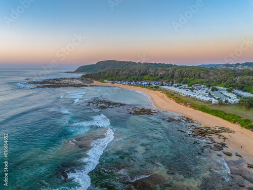 Aerial sunrise at the beach with clear skies