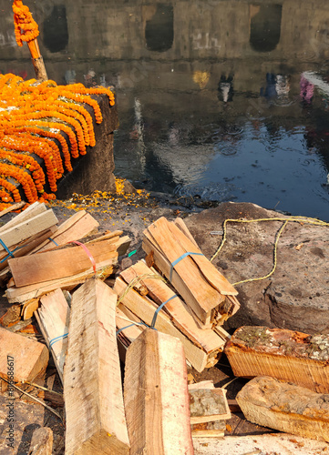 Preparing of Funeral pyre at the Pashupatinath temple complex on Bagmati River, Kathmandu Valley