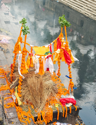 Preparing of Funeral pyre at the Pashupatinath temple complex on Bagmati River, Kathmandu Valley
