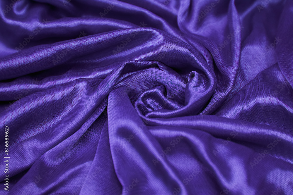 an up close view of purple silk fabric with a smooth surface an up close view of purple silk fabric with a smooth surface