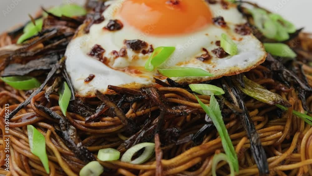 Scallion Oil Noodles with fried egg on top and chilli oil. Rotating ...