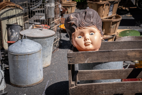 Head of a doll on the market