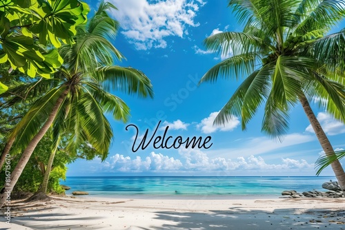 Tropical beach with palm trees and welcome sign 