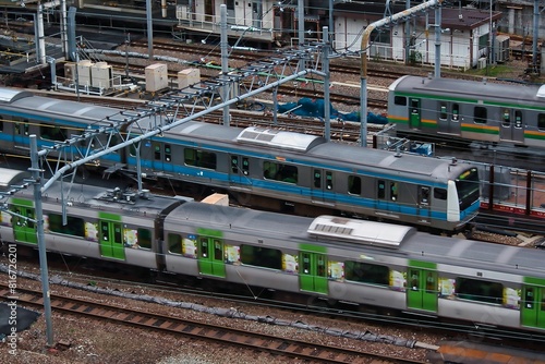 Valokuva Multiple JR trains leaving Tokyo Station