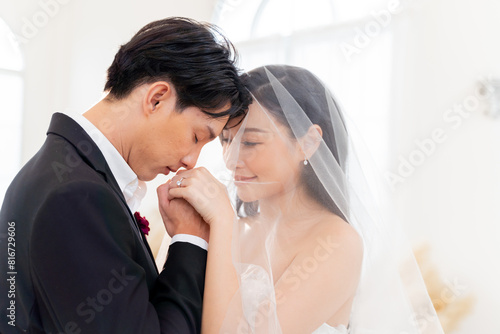 Bride and groom showcase their rings, a close-up view., symbolizing eternal love and commitment - wedding ceremony concept