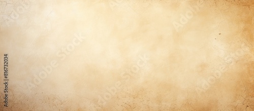 A rough textured white beige paper background with light spots offering a blank copy space image in shades of beige yellow and brown
