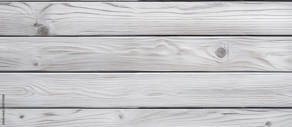 Fototapeta premium A wood plank texture in white color suitable for use as a background with space for copy
