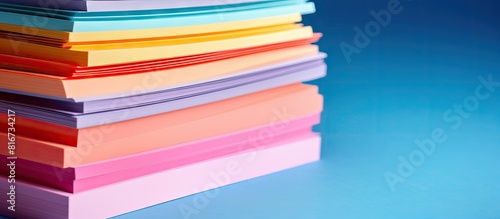 Wallpaper Mural A stack of colored paper sheets with copy space image Torontodigital.ca