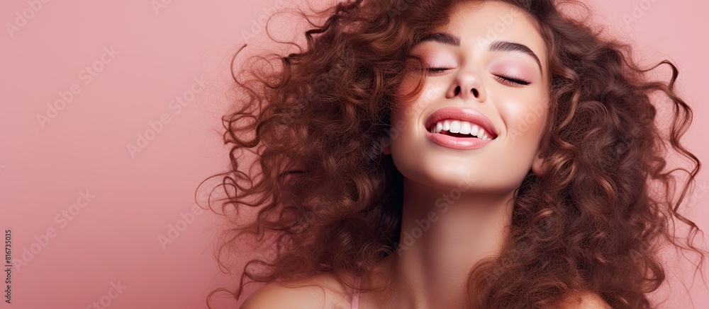 A young and attractive woman sending kisses to the camera in a playful manner. with copy space image. Place for adding text or design A young and attractive woman sending kisses to the camera in a playful manner. with copy space image. Place for adding text or design