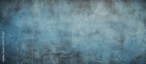 A textured background with a blue cement and concrete design featuring a vignette effect The background offers ample room for text or images © vxnaghiyev