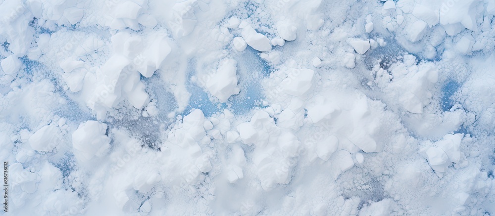 A snow texture background is seen from a high angle view with plenty of copy space in the image A snow texture background is seen from a high angle view with plenty of copy space in the image