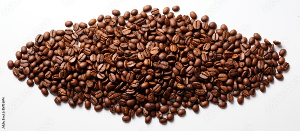 A top down copy space image of a Christmas tree crafted from roasted coffee beans on a white background ready for your messages A top down copy space image of a Christmas tree crafted from roasted coffee beans on a white background ready for your messages