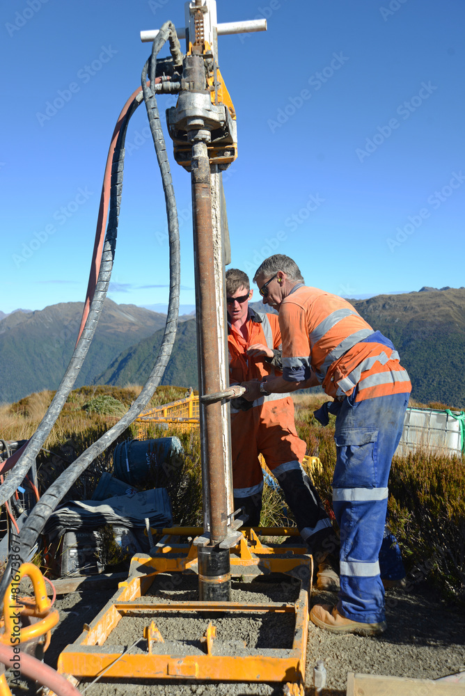 drilling a hole on the summit drilling a hole on the summit