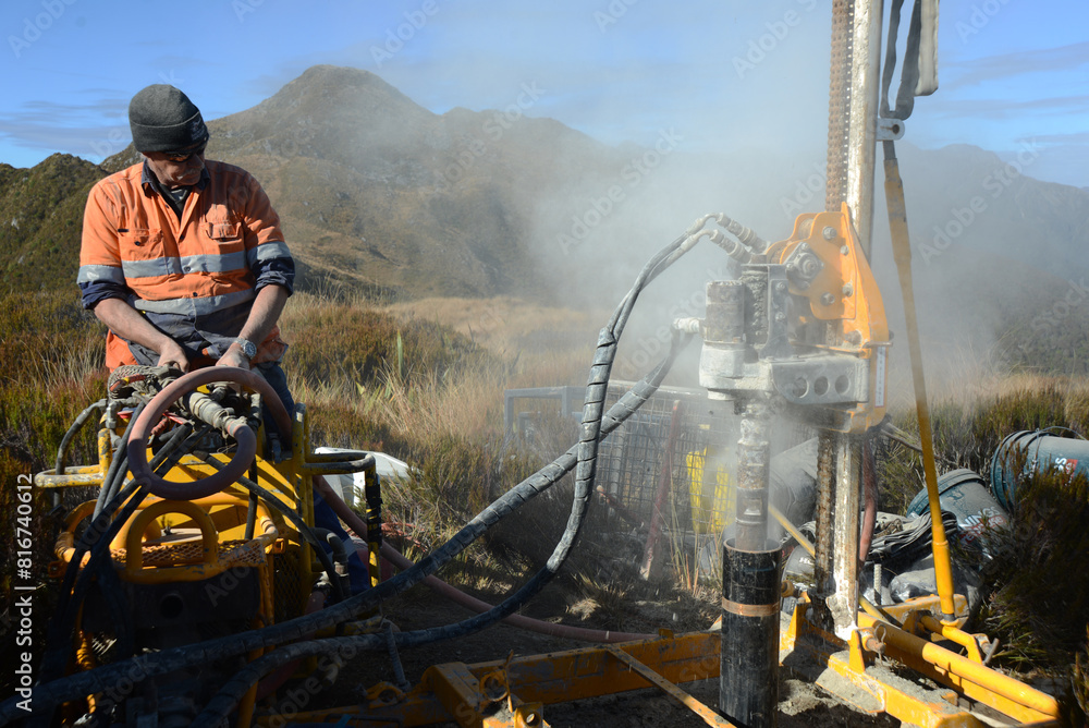 Obraz premium drilling a hole on the summit