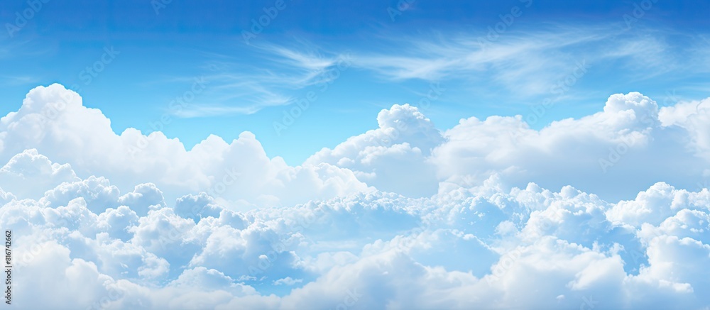 In the summer the sky and clouds fill with saturated air creating a picturesque image with ample copy space In the summer the sky and clouds fill with saturated air creating a picturesque image with ample copy space
