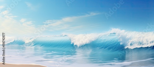 Copy space image of a serene ocean wave gently crashing onto a pristine sandy beach creating a mesmerizing background
