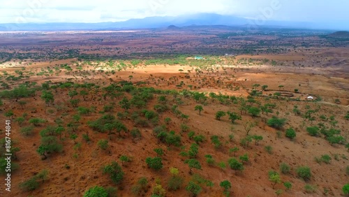 Drone footage of the rolling hills in the Masaai lands near Arusha city at sunset in Tanzania photo