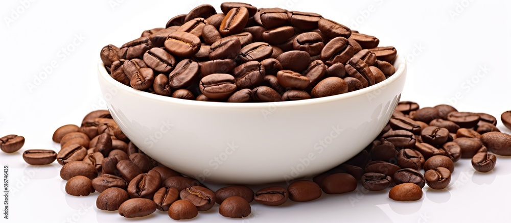 Fototapeta premium A white background provides ample copy space for an image of isolated coffee beans