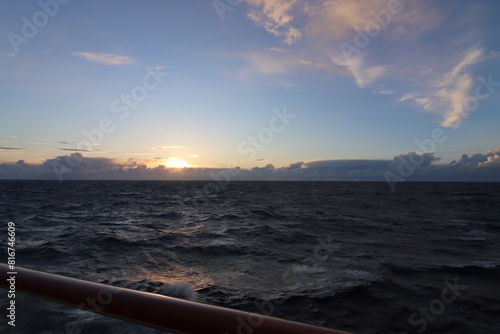 фотографія Cruise across the turbulent Atlantic Ocean at dusk