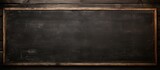 Copy space image of a black chalkboard suspended against a rustic wooden backdrop devoid of any inscription