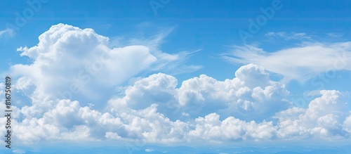 A picturesque view of a blue sky with fluffy white clouds perfect for a copy space image