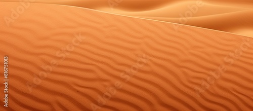 A background of orange sand with plenty of empty space for adding an image. Copyspace image © StockKing