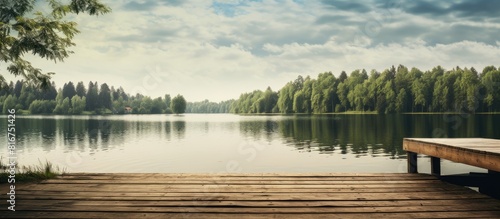 An idyllic rural scene showcasing a picturesque forest river lake with a wooden pier glistening water surface and the rustic texture of wood This serene landscape embodies nature ecology ecotourism h photo