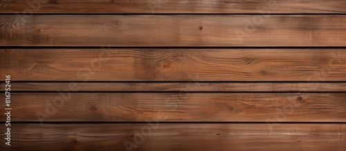 A copy space image featuring a textured background of horizontal brown wood planks