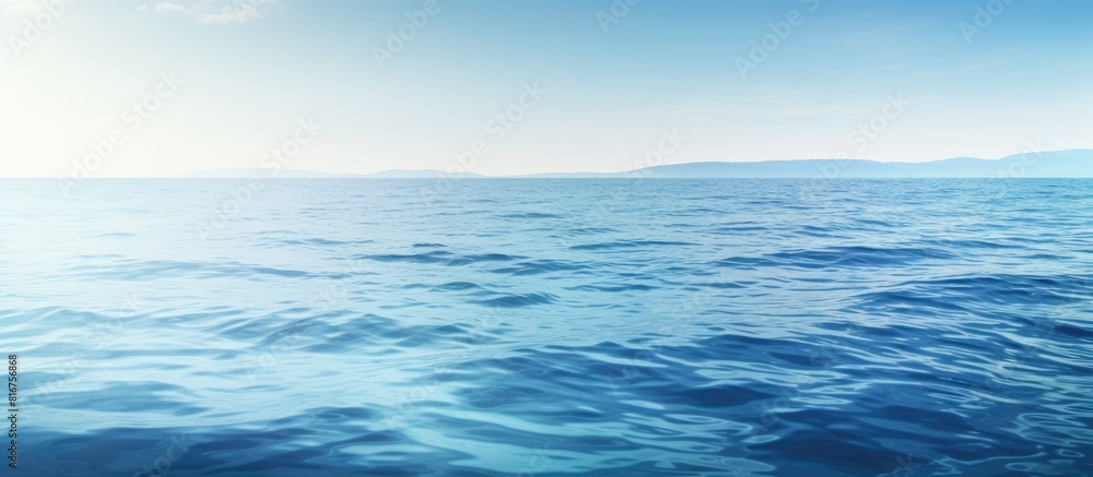 Obraz premium A serene abstract view of the ocean s tranquil surface in the early morning offering ample copy space for creative use