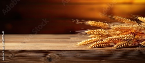 Wheat Ears on the Wooden Table Sheaf of Wheat over Wood Background Harvest concept. copy space available