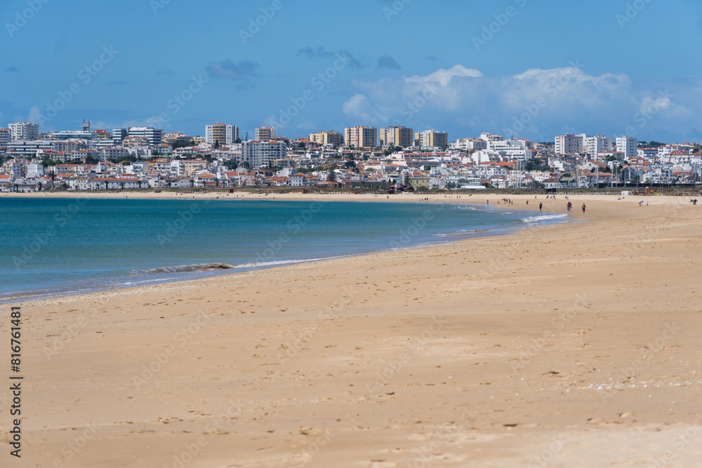 Meia Praia beach in Lagos, Algarve, Portugal. Crystal clear sea water. Sunny day. Meia Praia beach in Lagos, Algarve, Portugal. Crystal clear sea water. Sunny day.