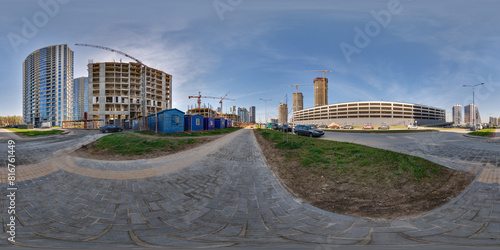 hdri 360 panorama near new with skyscrapers and residential complex under construction with high-rise tower cranes in full equirectangular seamless spherical projection