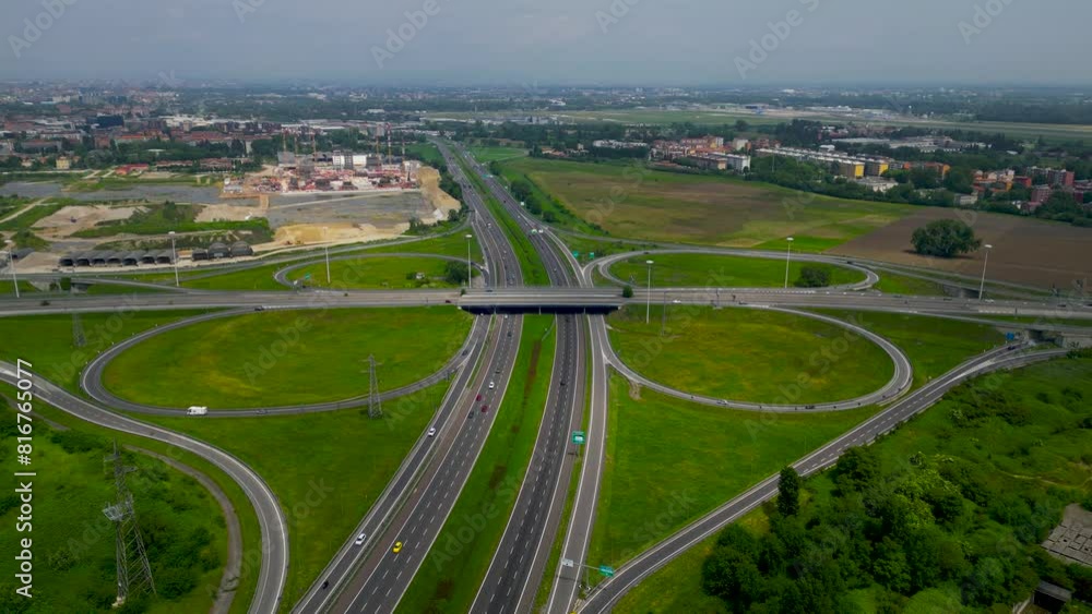 Cars driving on the freeway outside the city, top view. lombardia, Italia. High quality 4k footage Cars driving on the freeway outside the city, top view. lombardia, Italia. High quality 4k footage